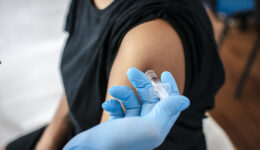 Closupe of a Adult Medicine Doctor Injecting a Vaccine Into a Patient’s Arm Meningitis Vaccine Side Effects