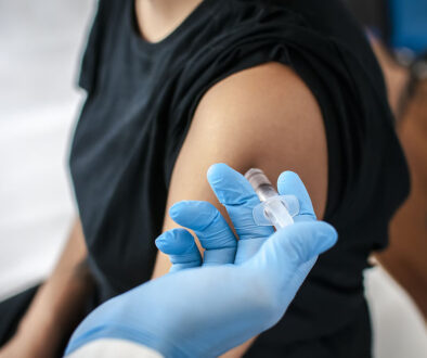 Closupe of a Adult Medicine Doctor Injecting a Vaccine Into a Patient’s Arm Meningitis Vaccine Side Effects